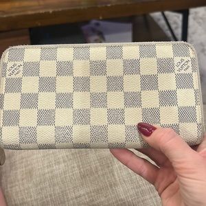 Louis Vuitton zip wallet. Slight wear